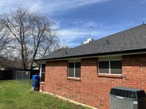 dark gutter on red brick home