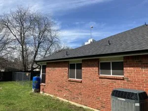 dark gutter on red brick home